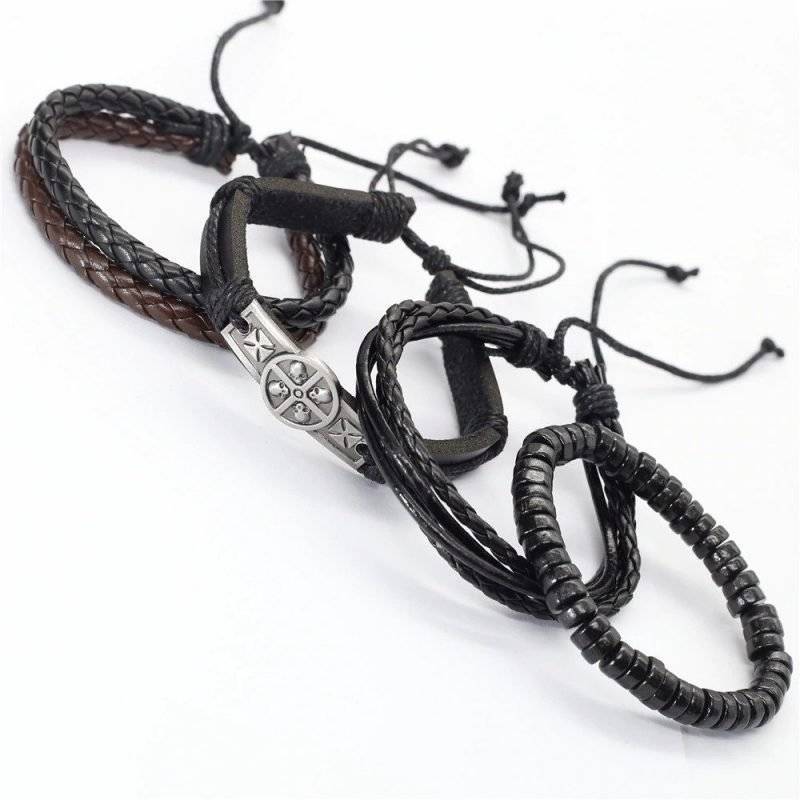 4-Piece Black Bracelet Set with Decorative Charm