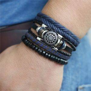 4-Piece Black Bracelet Set with Decorative Charm